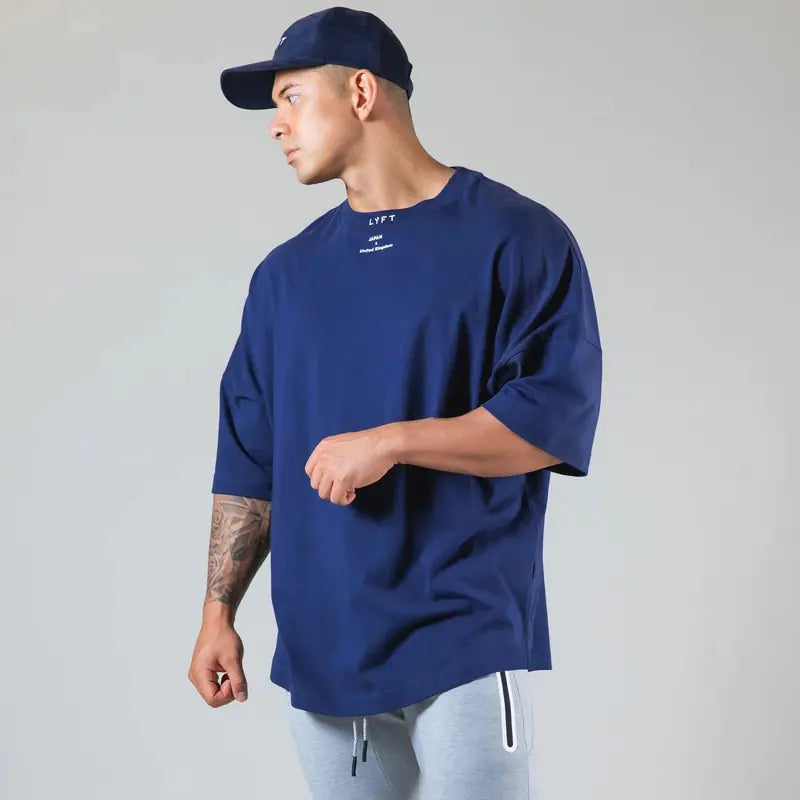 man wearing a blue Streetwear Oversized T-Shirt from luxuslinea